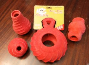 Assortment of red dog toys